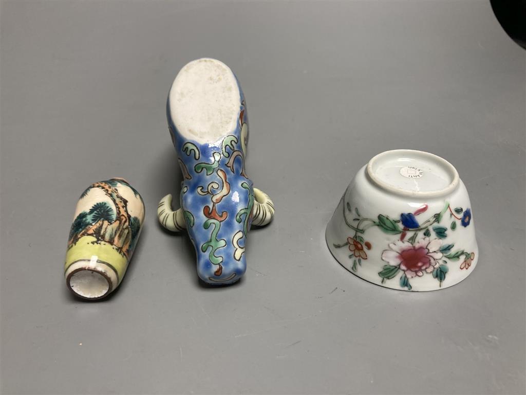 A Chinese famille rose cup, an ox rhyton cup and an enamel on copper snuff bottle